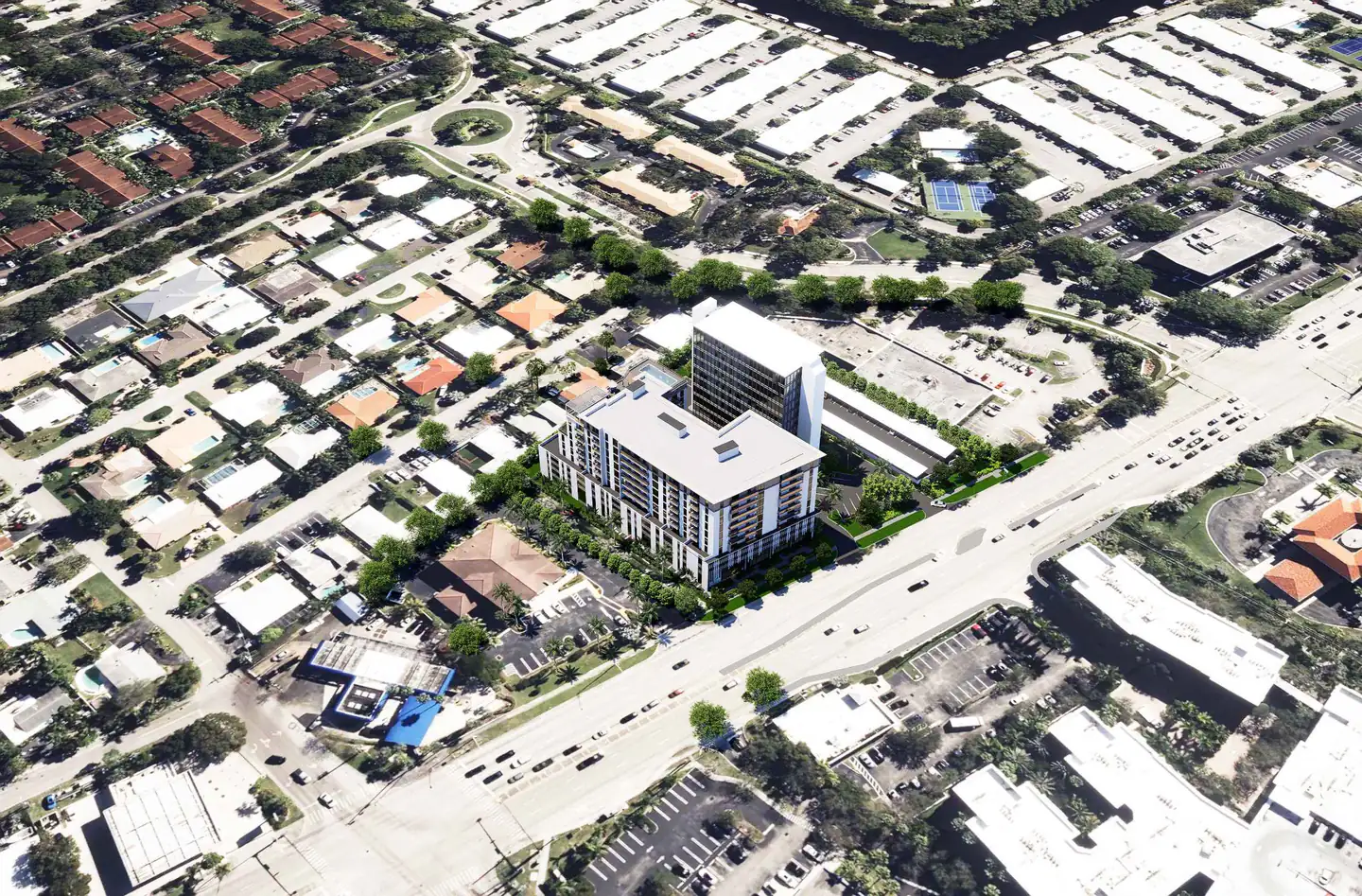 Architect’s rendering R-002, aerial context: the proposed residential building seen from above among low-rise streets, with the highway alongside.