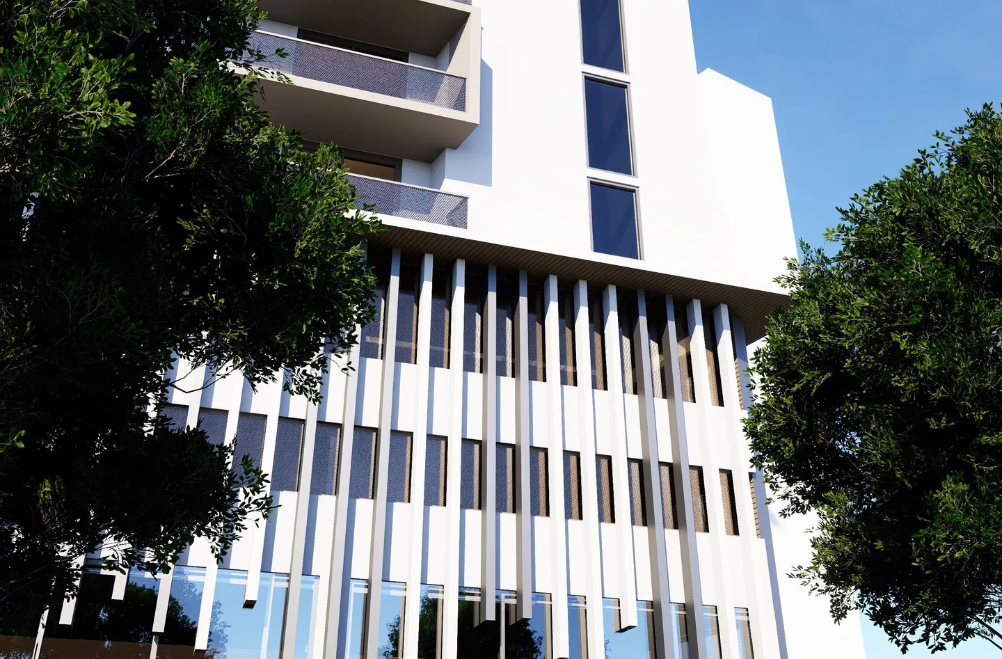 Architect’s rendering R-012: a close view of the proposed façade, with white panels, vertical fins and balconies framed by trees.