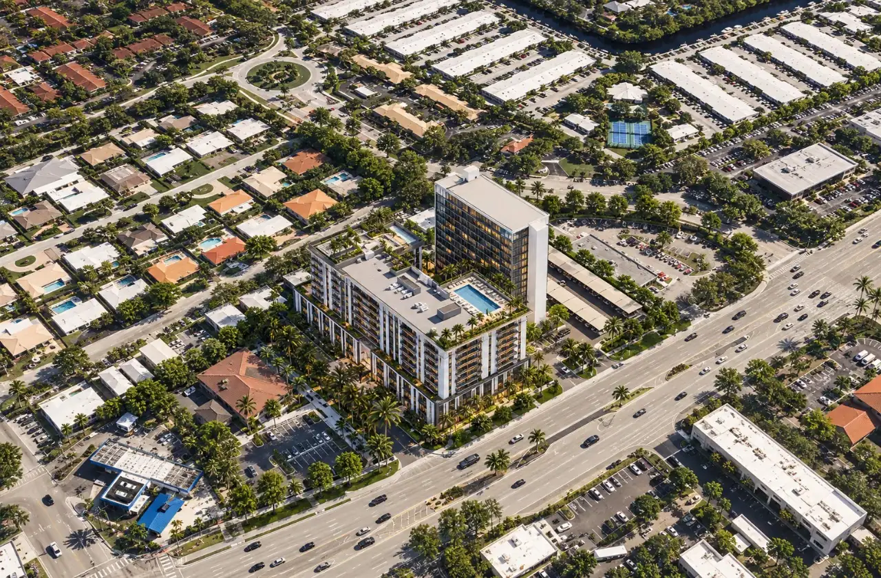 Conceptual visualisation based on R-002: the existing office tower and the proposed residential building beside it, seen from the air.